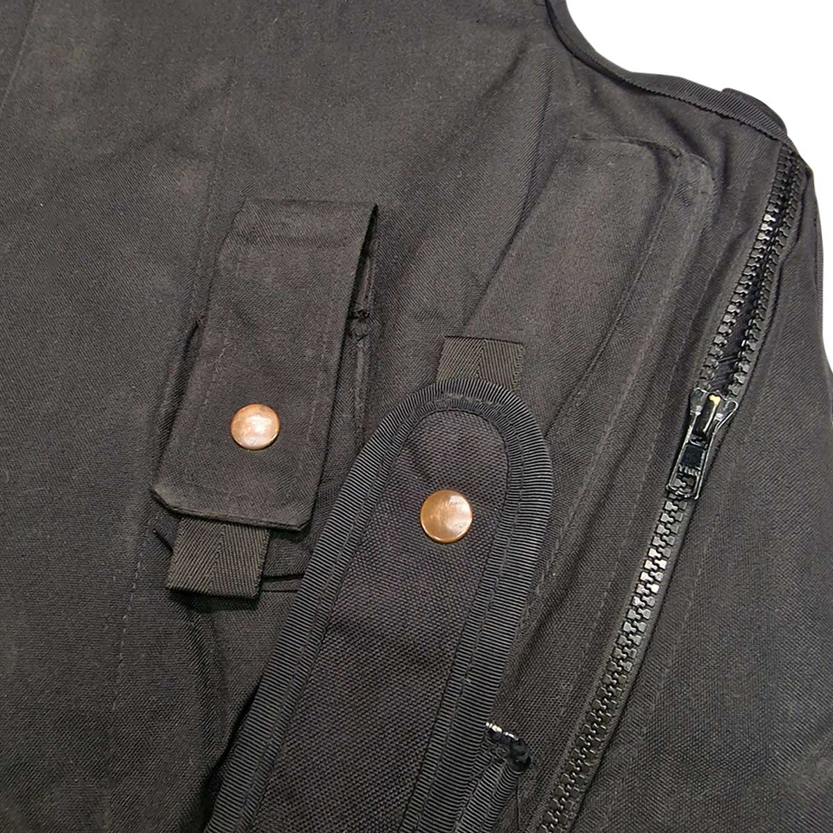 front pouches and zip of global armour overt stab bulletproof vest used