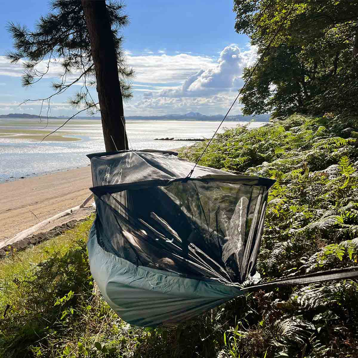 outdoor setup of dd hammocks frontline king size olive green hammock